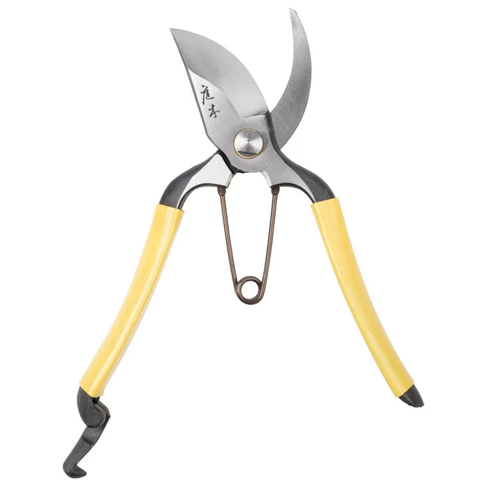 Gardening shears with yellow handles on a white background