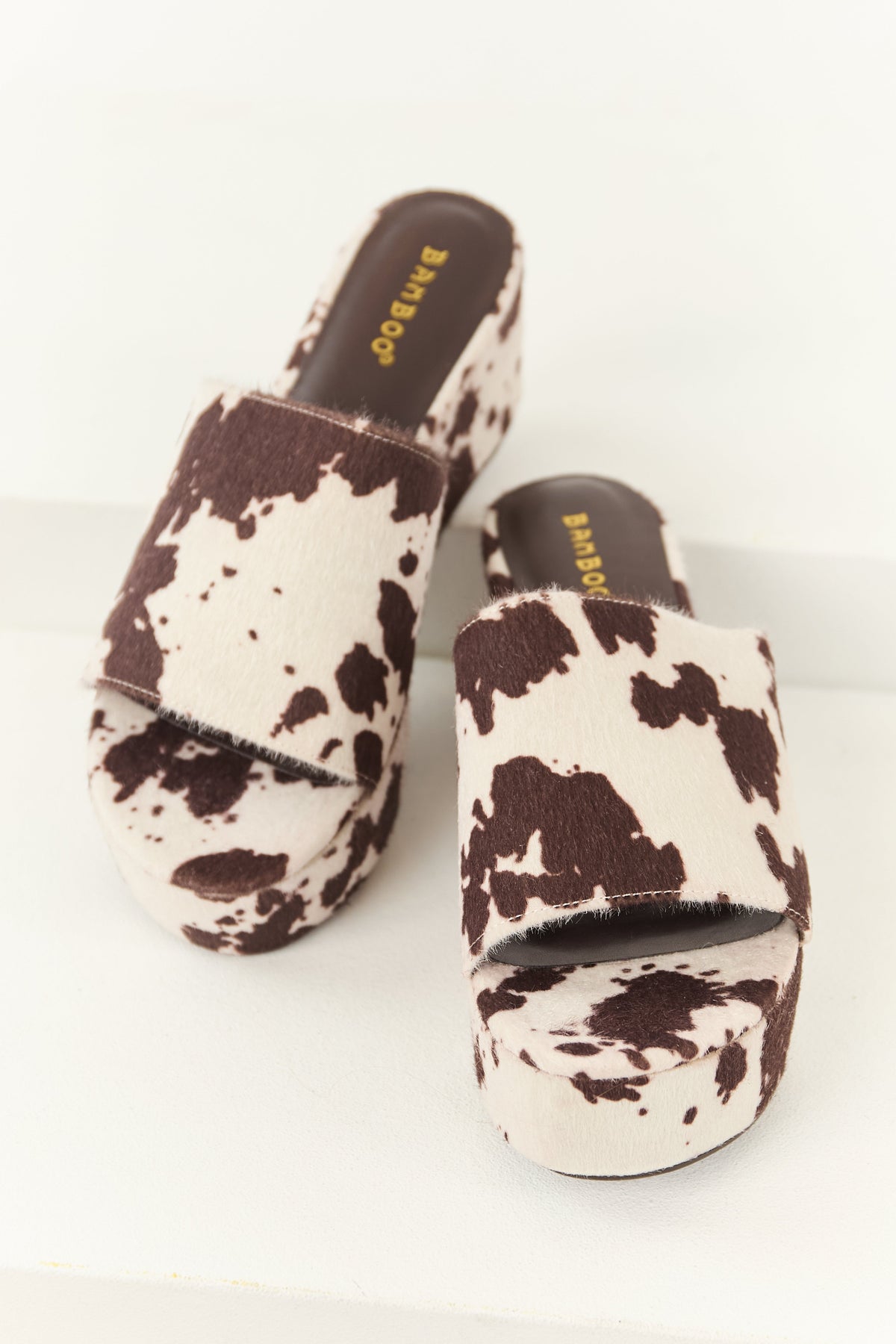 Cocoa Faux Fur Cow Print Slip On Open Toe Wedges