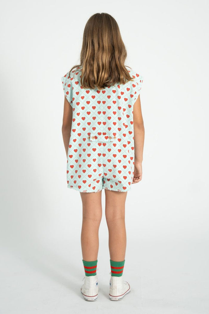 Short Sleeveless Jumpsuit in Light Blue w/Red Hearts Allover