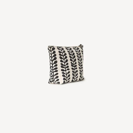 Pouch with black leaf pattern on a white background